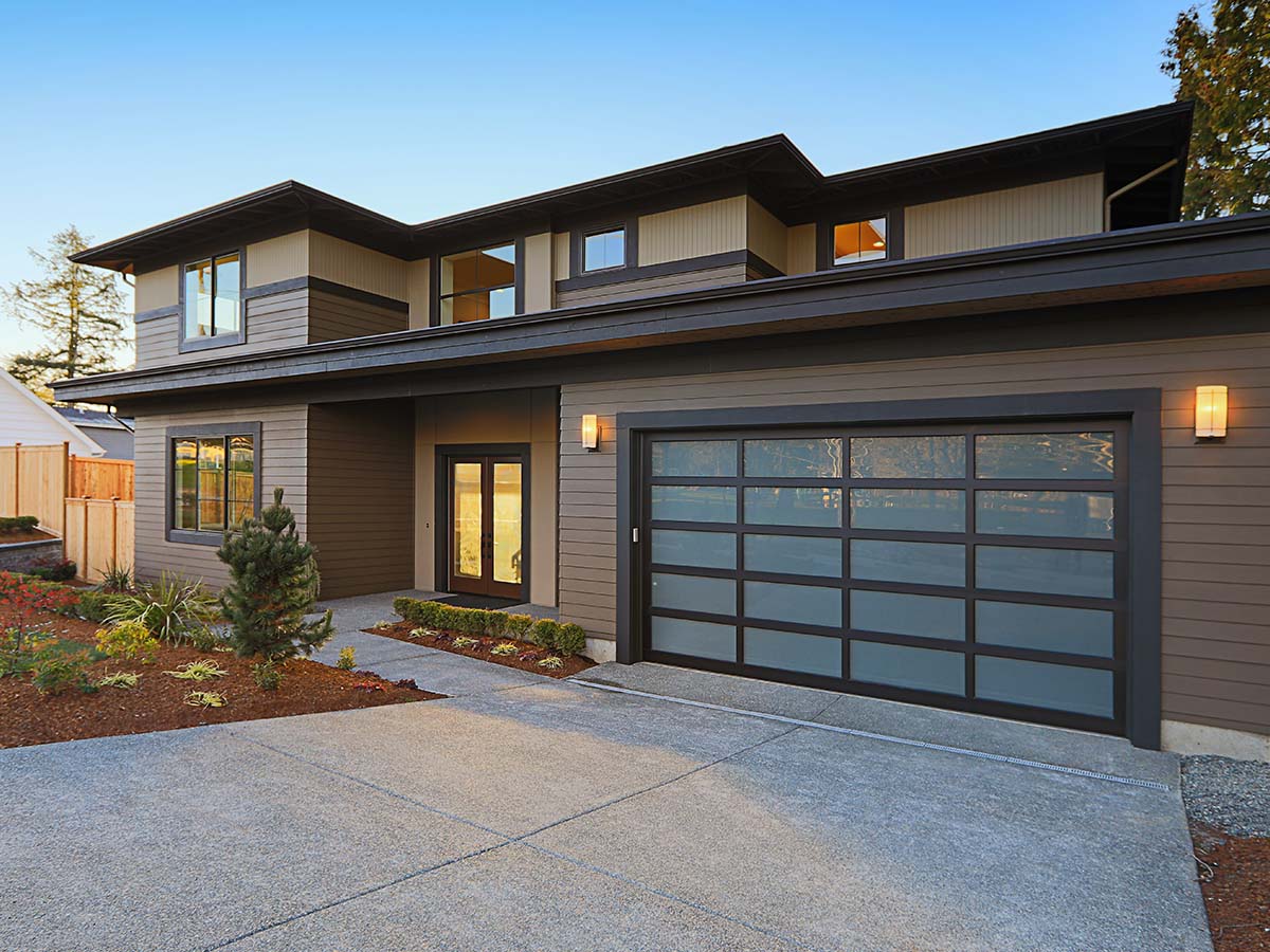 New construction home exterior with contemporary house plan