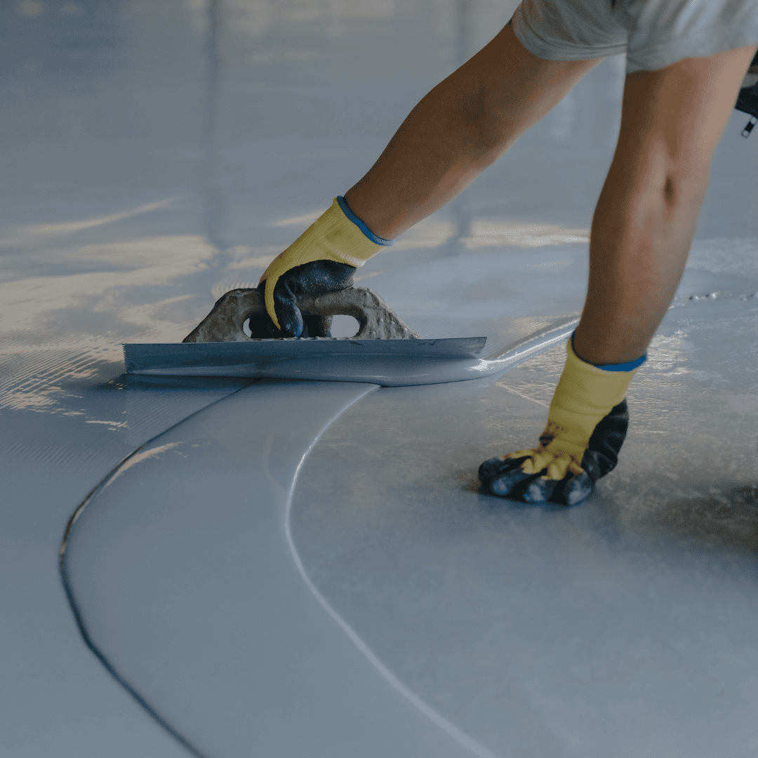 Epoxy floor coating being applied