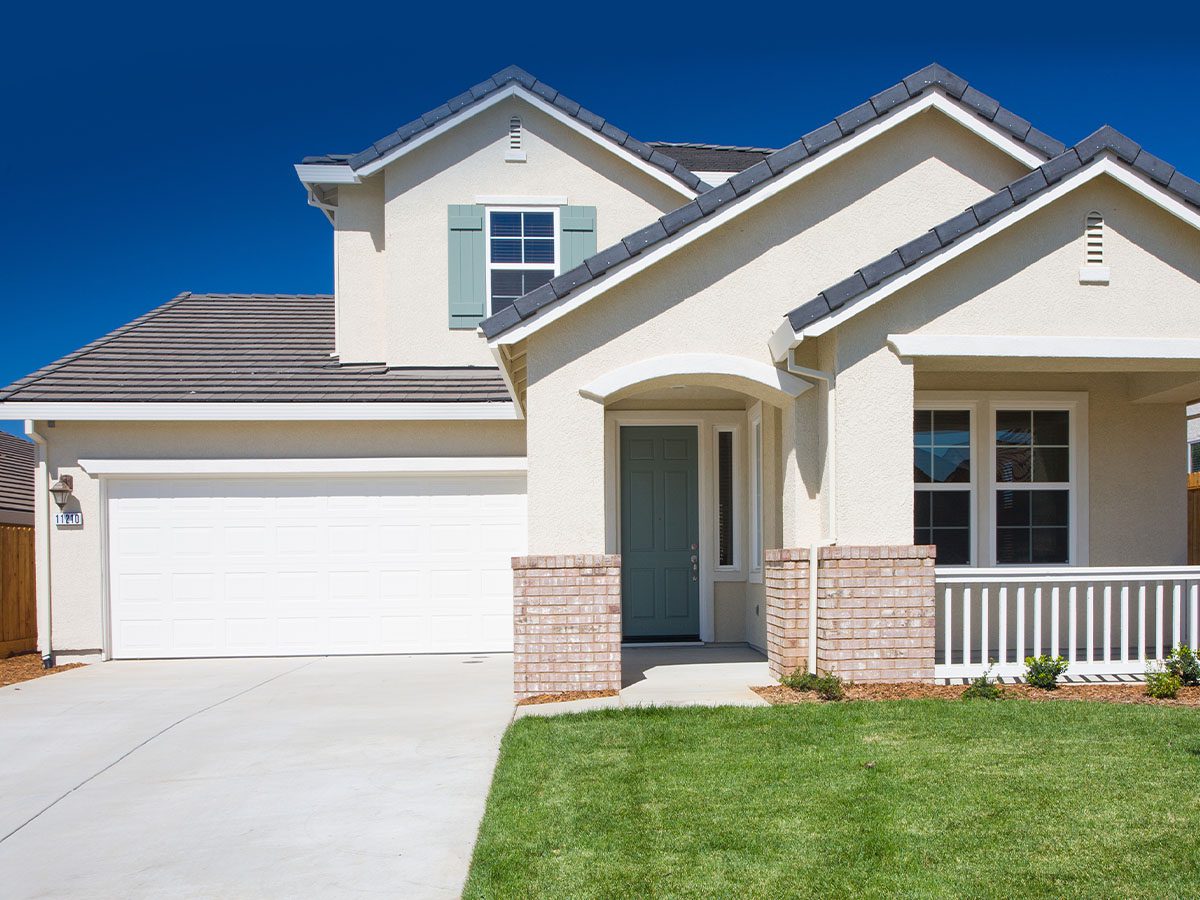 modern residential home with white garage door
